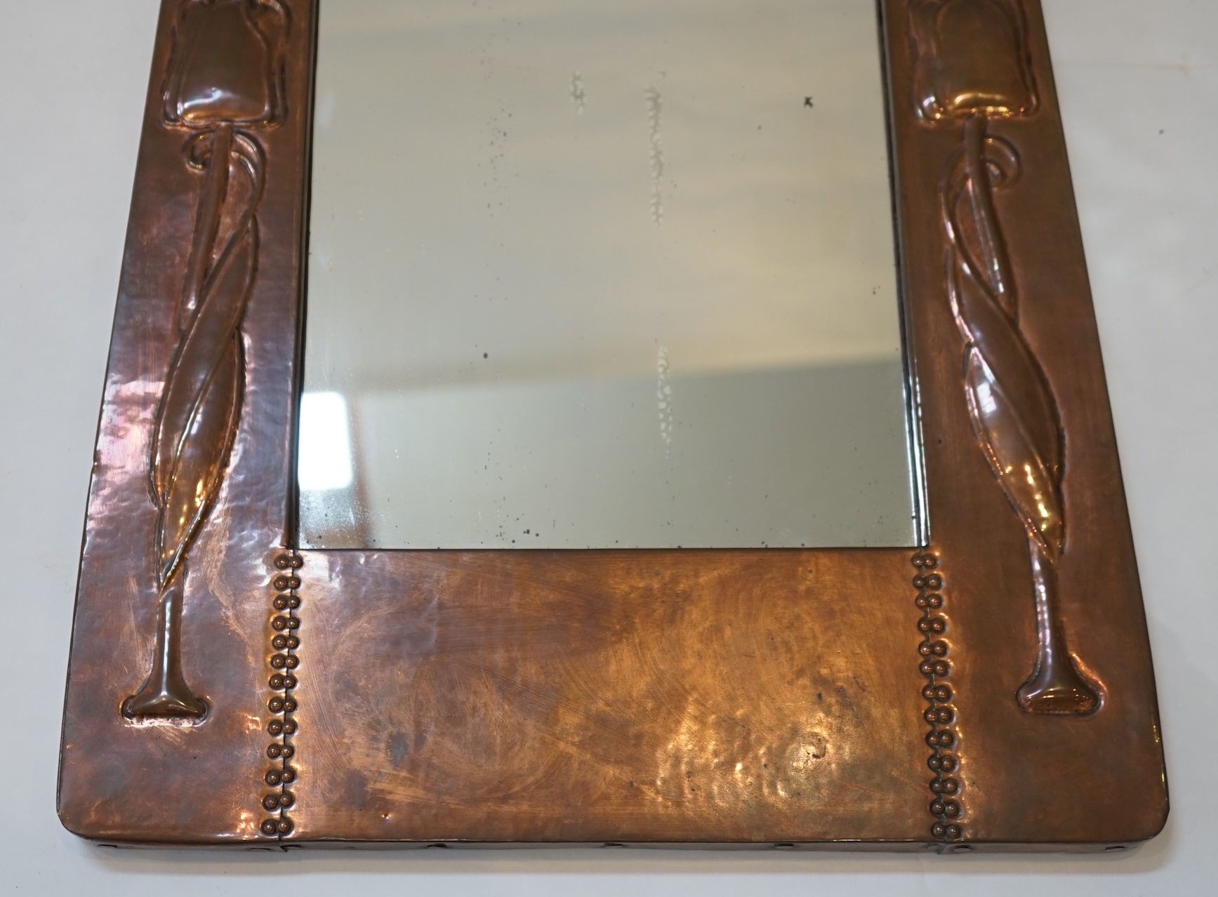 A Liberty Arts & Crafts copper wall mirror